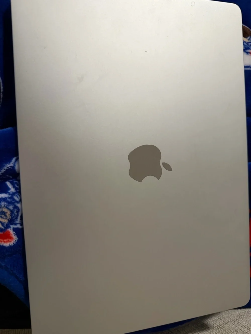 Apple MacBook Air 15-inch Silver with Blue Screen Icon